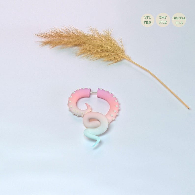 May include: A pink and blue gradient octopus ear gauge with white dots. The gauge is made of polymer clay and is a unique and stylish accessory.
