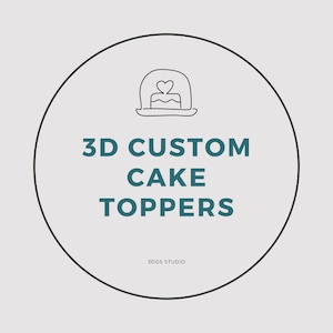 May include: A white circle with a black outline contains a line drawing of a cake with a heart on top. The text "3D CUSTOM CAKE TOPPERS" is in teal text below the cake. The text "3DGS STUDIO" is in smaller teal text below the main text.