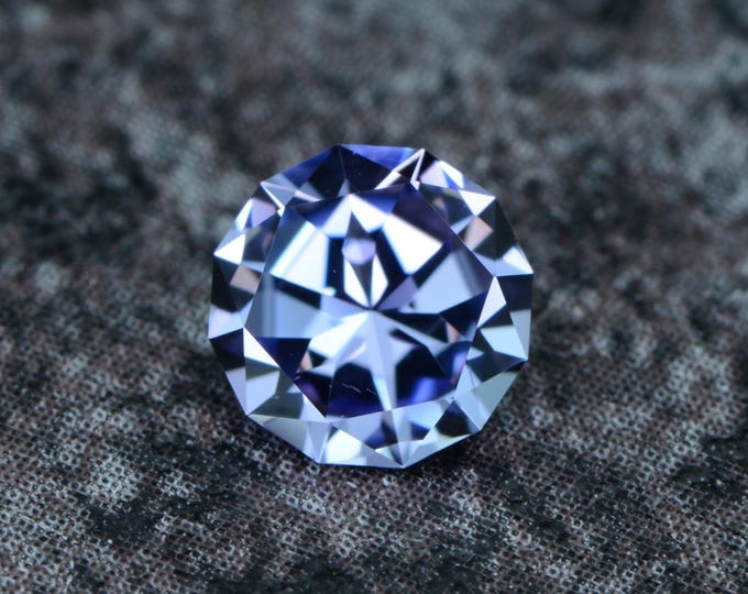 Tanzanite 0.58 carats light blue lavender Tanzania naturally faceted, precision cut from Germany