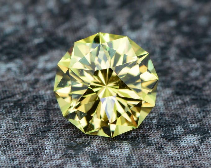 Mali Garnet 0.83 carat green-yellow from Mali naturally untreated faceted, precision cut from Germany