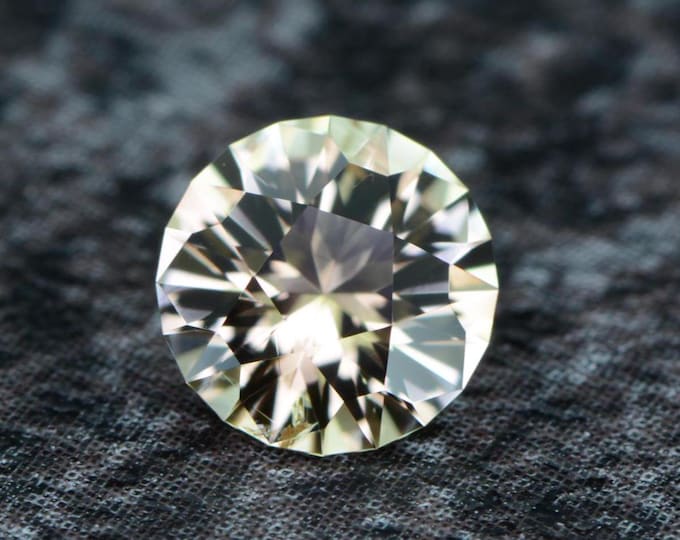 Topaz 0.72 carat cream champagne from Ouro Preto, Brazil - untreated naturally faceted, precision cut from Germany