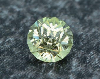 Mali Garnet 0.79 carat green-yellow from Mali untreated faceted, precision cut from Germany