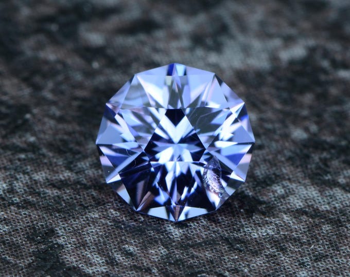 Tanzanite 0.87 carats light blue lavender Tanzania naturally faceted, precision cut from Germany