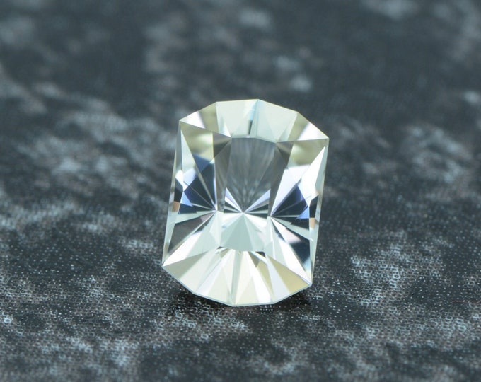 Tourmaline 0.67 carat light beige Congo untreated faceted, precision cut from Germany