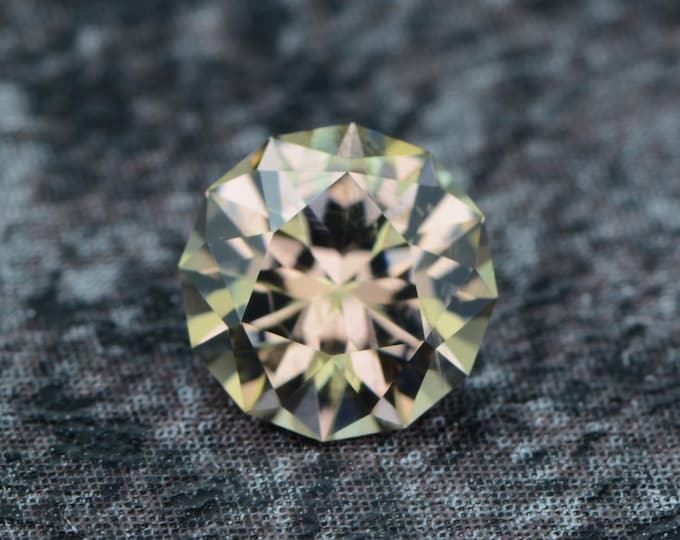 Zircon 0.94 carat beige-champagne Tanzania Africa natural untreated faceted, precision cut from Germany