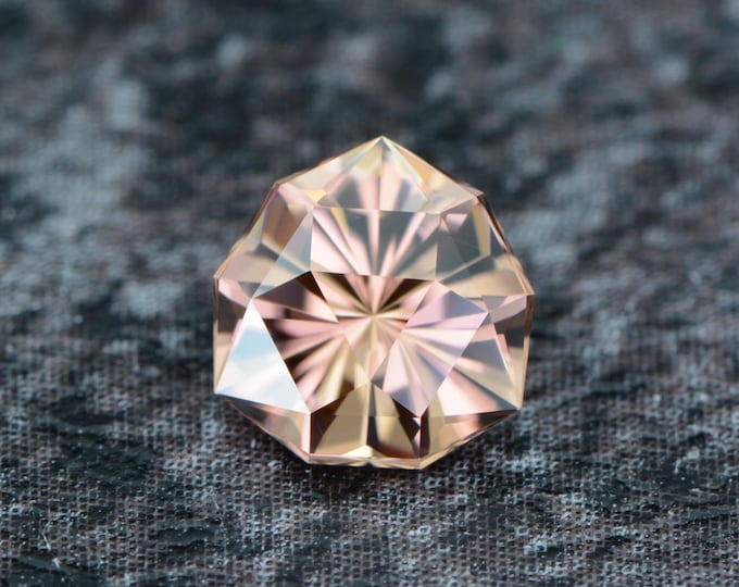 Zircon 0.96 carat cinnamon pink copper Mozambique naturally faceted, precision cut from Germany