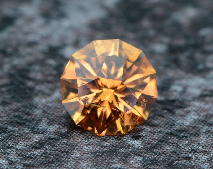 Spessartine garnet, 0.60 carats, mandarin orange, from Nigeria, untreated, faceted, precision cut in Germany