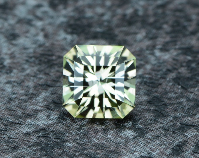 Tourmaline 0.96 carat light olive green Nigeria untreated faceted, precision cut from Germany