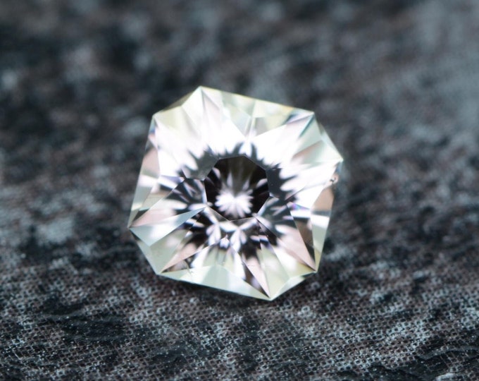 Tourmaline 0.66 carat peach beige Congo untreated faceted, precision cut from Germany