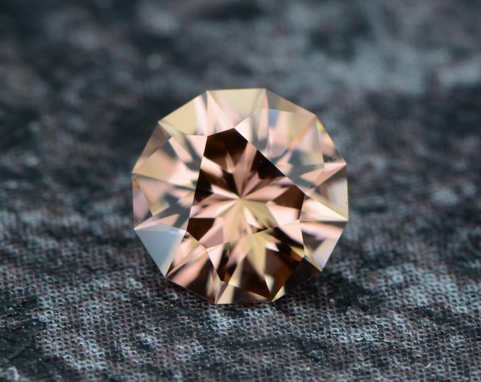 Zircon 0.81 carat cinnamon pink copper Mozambique naturally faceted, precision cut from Germany