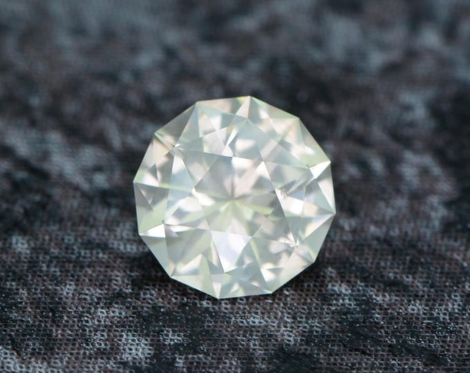 Sapphire 0.68 carat light yellow Tunduru Tanzania naturally faceted, precision cut in Germany