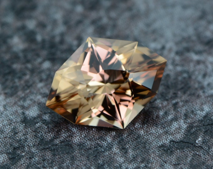 Topaz 1.29 carat light orange peach from Guerrero, Mexico - naturally faceted, precision cut from Germany