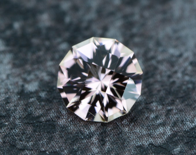 Tourmaline 0.74 carat peach pink Congo untreated faceted, precision cut from Germany
