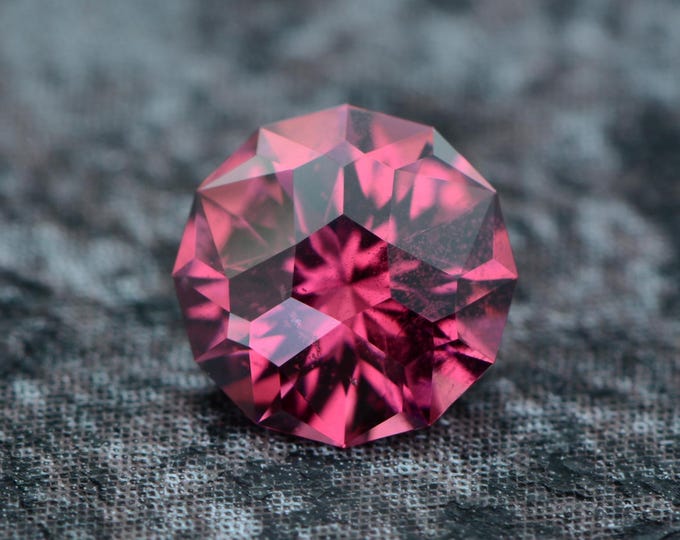 Rhodolite Garnet 0.81 carat pink berry from Tanzania, Africa untreated faceted, precision cut from Germany