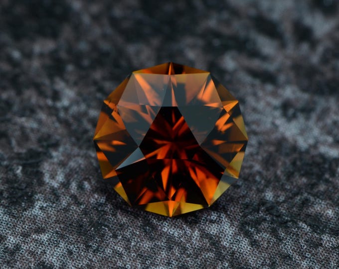 1.62 carat dark orange tourmaline from Tanzania, naturally untreated, faceted, precision cut in Germany