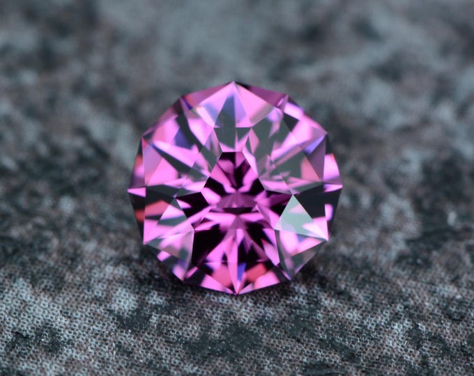Umbalite garnet 1.45 carats pink from Tanzania - untreated faceted, precision cut in Germany