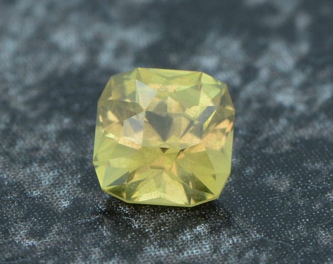 Sapphire 0.61 carat yellow from Umba, Tanzania faceted, precision cut from Germany
