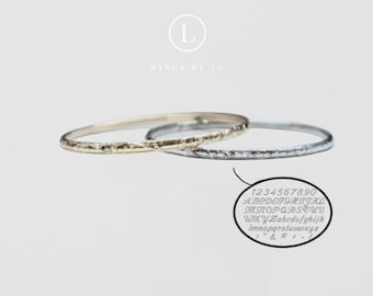 Minimalistische armband met gravure aan de binnenkant.
