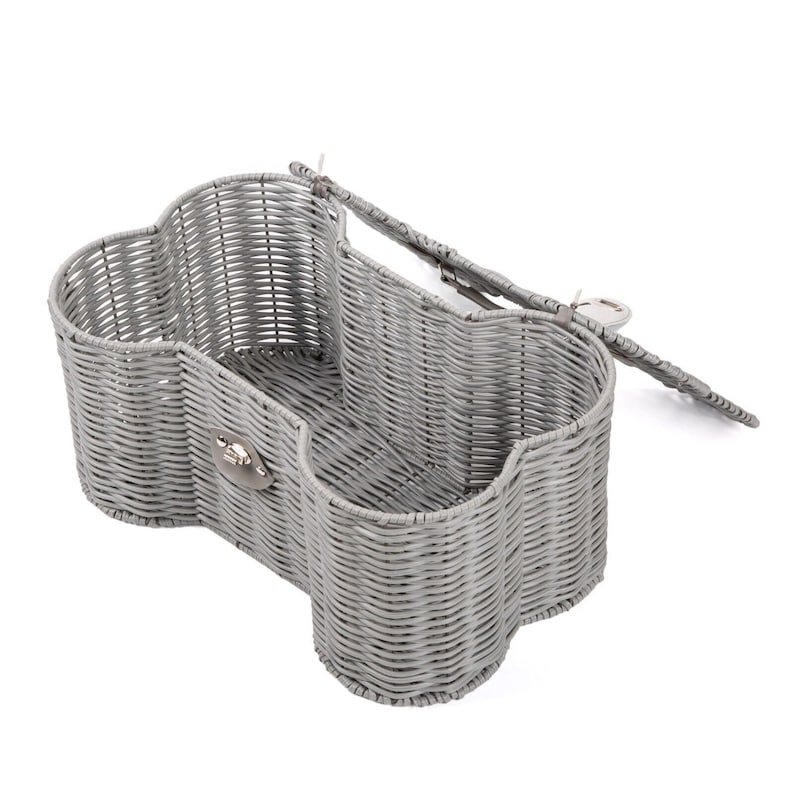 May include: A grey woven basket shaped like a dog bone with an open lid. The basket features a silver-toned metal latch on the front and a hinged lid attached to the back. The structure is made of thin, uniform grey strips woven in a pattern.
