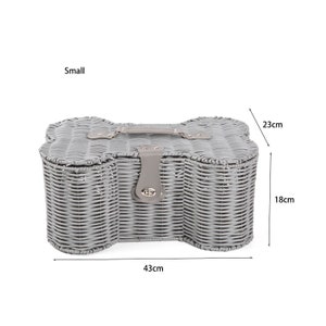 May include: A small grey woven wicker basket shaped like a bone with a grey handle and a central latch closure. The basket features dimensions of 43 cm in length, 18 cm in height, and 23 cm in width, as indicated by the text and arrows in the image.