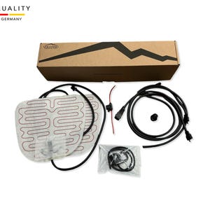 May include: A set of two white heated seat cushions with red wiring, a brown box with the text "Volcano" and "High Quality Made in Germany", and black wiring with connectors.