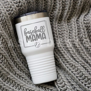 May include: White stainless steel tumbler with a black and white baseball graphic and the text "baseball mama".