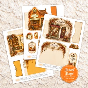May include: A set of printable paper craft sheets featuring autumn-themed illustrations of a pumpkin pantry and an acorn bookshop. The designs include shop fronts, decorative tags, and journaling cards with text like Little Pumpkin Pantry.