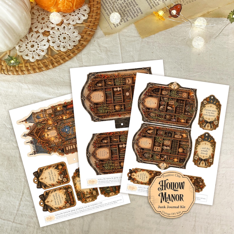 Op de afbeelding: Drie vellen bedrukt papier met een Hollow Manor Junk Journal Kit. De ontwerpen bevatten gedetailleerde illustraties van boekenplanken, sierlijke kaders en decoratieve labels met de tekst Everyone wants to see their dearly departed.