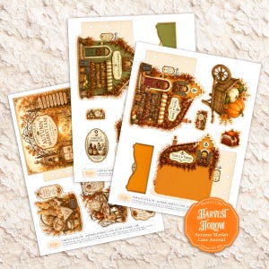 May include: A collection of printed paper sheets featuring die-cut illustrations of autumn-themed shops, a wooden cart with pumpkins, bread, and apothecary items. The sheets include text labels such as Harvest Hollow, Autumn Market Lane, and Thistle & Thread.