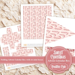 May include: A set of Christmas-themed paper sheets with candy cane patterns. The set includes a folding advent calendar box with 24 mini boxes, a triangular banner, and other decorative elements. The design features pink and white colors with the text "Sweet Christmas Advent Calendar Box".