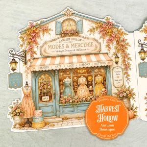 Puede incluir: Una manualidad de papel troquelado de una fachada de boutique titulada Harvest Hollow Modes & Mercerie, con un toldo a rayas, maniquíes con vestidos, follaje otoñal, linternas colgantes y cajas de sombreros apiladas con una etiqueta naranja.