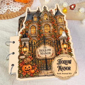 May include: A junk journal kit titled The Hollow Manor featuring a die-cut cover with a detailed illustration of a spooky mansion, a black cat, a ghost, pumpkins, and autumn foliage. The cover includes three metal binder rings on the left side.