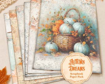 May include: A stack of decorative scrapbook paper sheets featuring a woven basket filled with light blue and orange pumpkins, autumn leaves, and musical notation backgrounds. An octagonal label reads Positive Chic AUTUMN DREAMS Scrapbook Paper Pack.