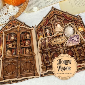 May include: A die-cut paper craft kit featuring a detailed illustration of a wooden bookcase filled with books, skulls, and ghosts, alongside a chest labeled Spirit Box and a crystal. A label reads Positive Chic Hollow Manor Seance Parlor Kit.
