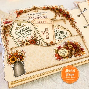 May include: A scrapbook page featuring cream-colored paper with autumn-themed floral illustrations, a tag labeled Bramble & Bloom Florist, a ticket reading One Bouquet, and a metal milk can graphic. Text includes Where Flowers Bloom So Does Happiness.