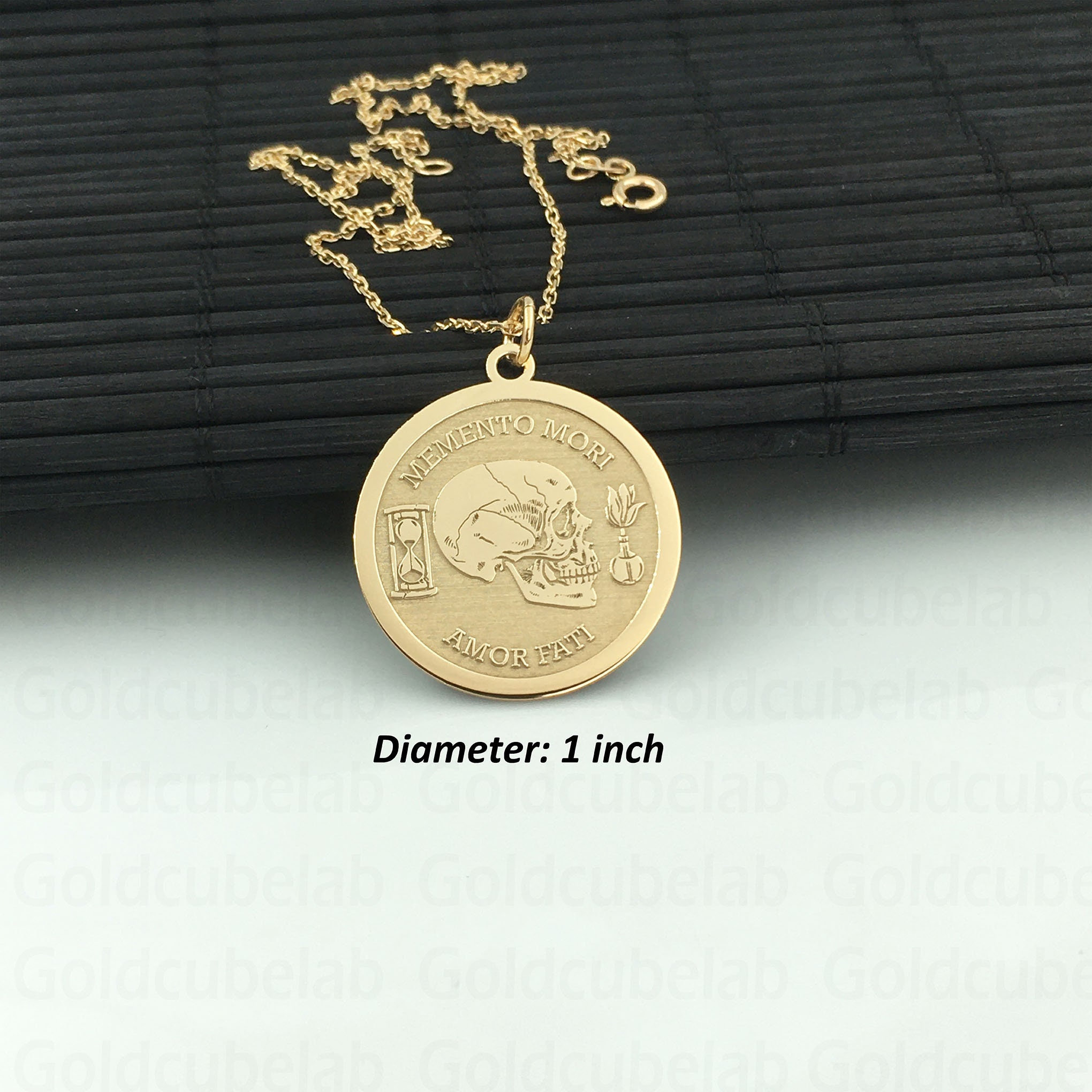 Memento mori gold pendant deals