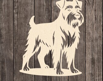 Puede incluir: Un recorte de madera beige claro de un perro, probablemente un terrier, de pie sobre una base plana. El perro tiene una apariencia detallada y texturizada con barba y pelaje ásperos. El fondo es una superficie de madera rústica.