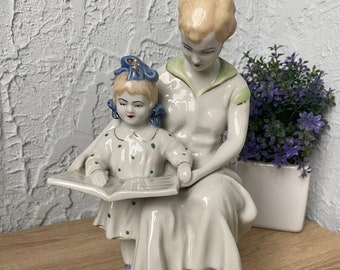 Vintage Soviet porcelain figurine The first letter book mother and girl for the first time at school .Ukraine Artel Keramik LCD