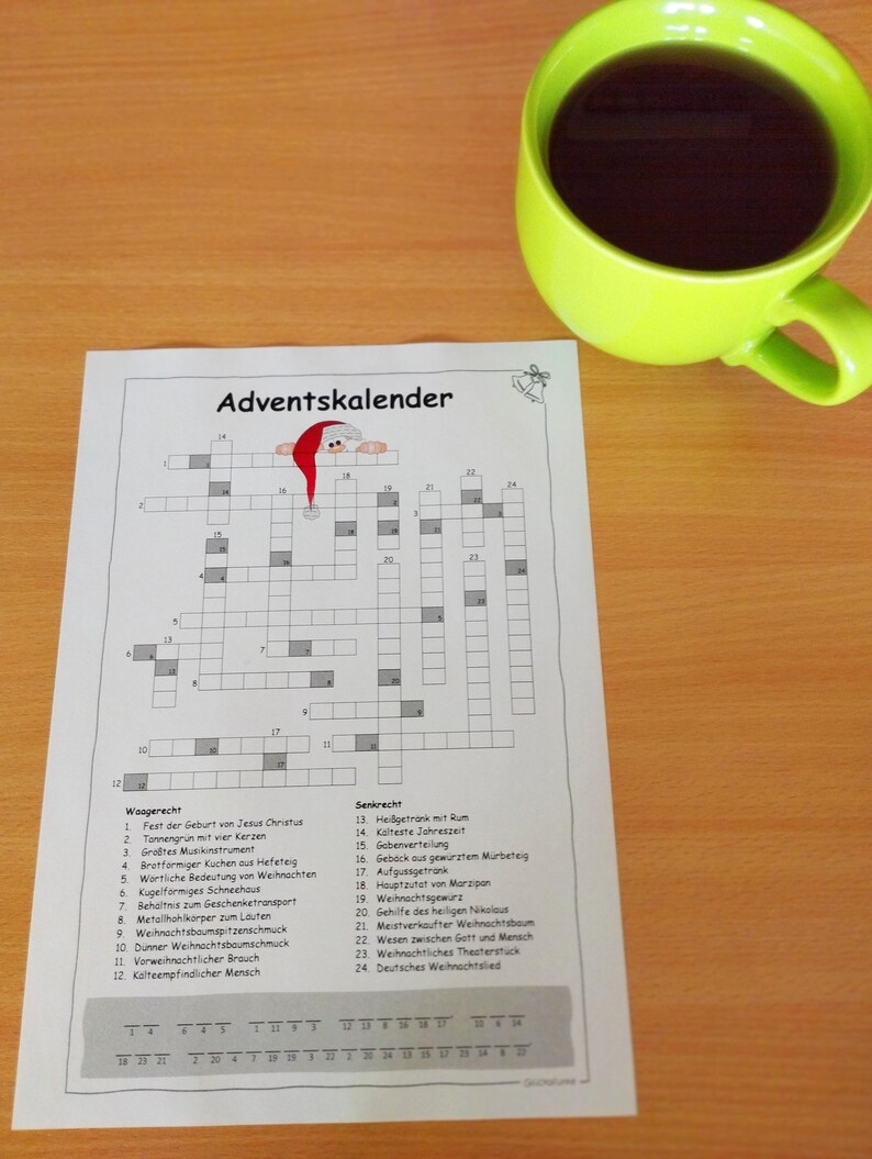 Puede incluir: Un crucigrama en blanco y negro con el t&iacute;tulo "Adventskalender" impreso en la parte superior. El crucigrama est&aacute; lleno de palabras alemanas relacionadas con la temporada navide&ntilde;a.