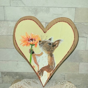 wooden heart painted on both sides