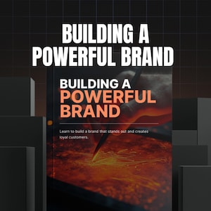 Op de afbeelding: Afbeelding van een boekomslag met de titel "BUILDING A POWERFUL BRAND" in witte en oranje tekst. De omslag toont een close-up van een hand die een gereedschap gebruikt op een vurige oppervlakte. De achtergrond is donker met zwarte rechthoekige vormen.