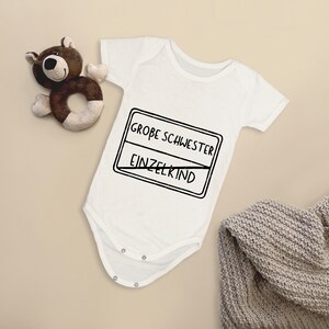 Spreadshirt Baby Body 'Große Schwester 2026' - Langarm Einzelkind Ende