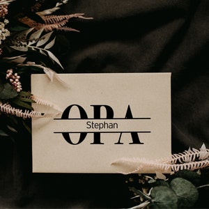 May include: A brown gift box with the text "OPA Stephan" printed in black.