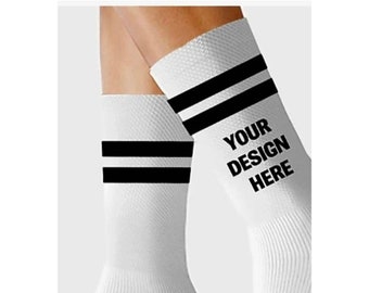 May include: White socks with black stripes and the text "YOUR DESIGN HERE" printed on them.