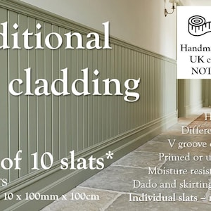 May include: Traditional sage green wall cladding with vertical slats. The image shows packs of 10 slats, handmade in a UK workshop. The text includes details about the product's features, such as different widths and moisture resistance.