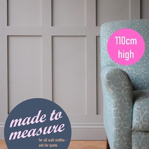 May include: A blue armchair with a white and blue patterned fabric. The chair is 110 cm high and is made to measure. The text "made to measure" and "back-boarded" is on a blue circle.