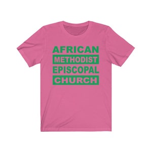May include: Pink short-sleeved t-shirt with the text "AFRICAN METHODIST EPISCOPAL CHURCH" in green.