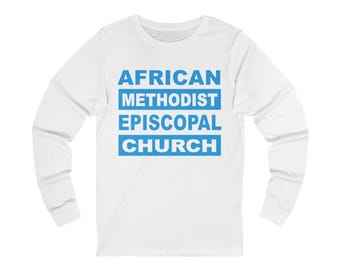 May include: White long-sleeve shirt with the text "AFRICAN METHODIST EPISCOPAL CHURCH" in blue block letters. The text is stacked in three lines. The shirt has a crew neck and long sleeves.