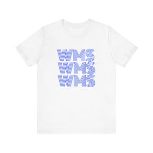 May include: A white short-sleeved t-shirt featuring a graphic print on the chest. The design consists of the letters WMS repeated in three stacked rows, rendered in a blue colour with a series of parallel lines forming each letter character.