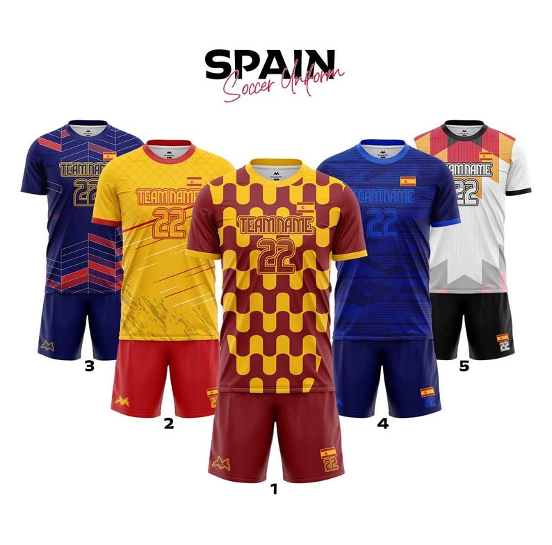 May include: Five soccer uniforms in various designs and colors, including navy blue, yellow, and burgundy. Each jersey has the number 22 and the text "TEAM NAME". The word "SPAIN" is at the top.